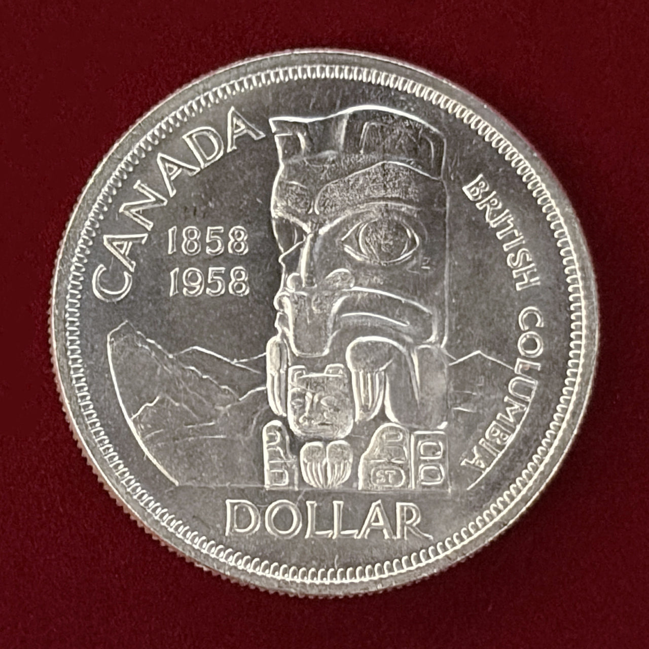 カナダ銀貨　1958年 ブリティッシュコロンビア100周年記念記念 カナダ】ブリティッシュコロンビア州100周年記念 1ドル 銀貨 1958［B